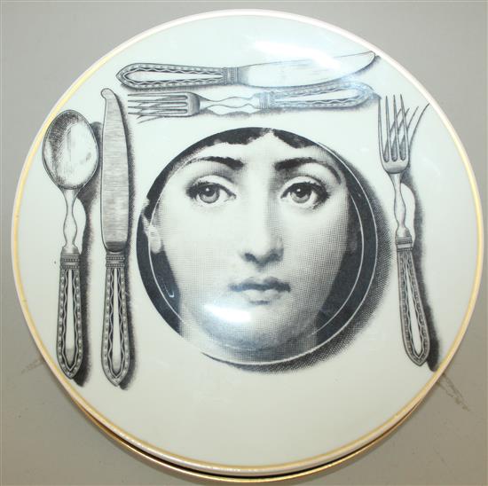 A collection of Fornasetti Temi e Variazioni and musical trophy pattern items,